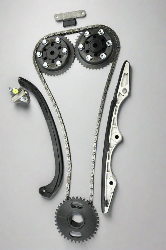 Automotive timing chain set with gears and sprockets on a white background