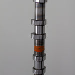 Metal camshaft on a gray background
