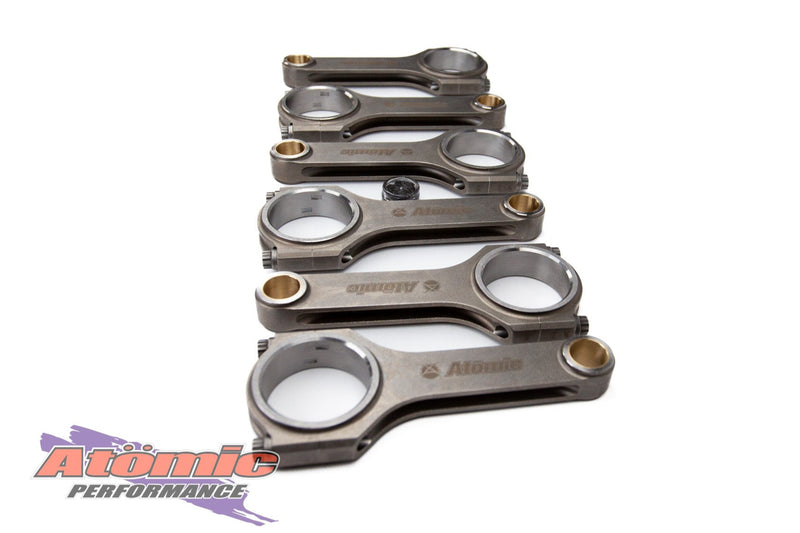 Load image into Gallery viewer, Set of connecting rods with Atomic Performance branding on a white background

