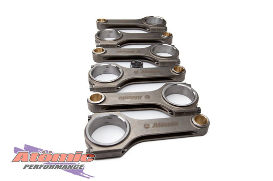 Set of connecting rods with Atomic Performance branding on a white background