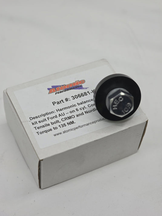 silver hex bolt with nordlock washer and black washer on white box with label and white background