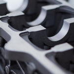 close-up of cast engine block with a white background