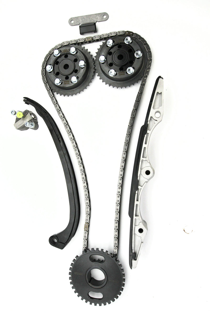 Load image into Gallery viewer, Automotive timing chain set with gears and sprockets on a white background
