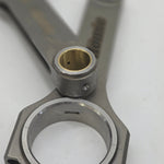 Metal connecting rod on a white background