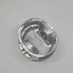 close up of internal side of  cast engine piston head on white background 