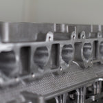 metal engine cylinder head with white background